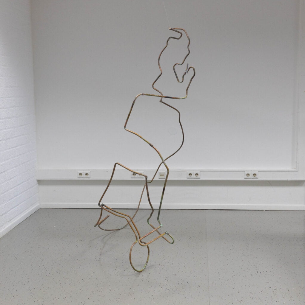 DG2A7126 Prototype of New Perspective made of copper tubing, the current view angle shows the transition of perspective of a wheelchair to a running woman.